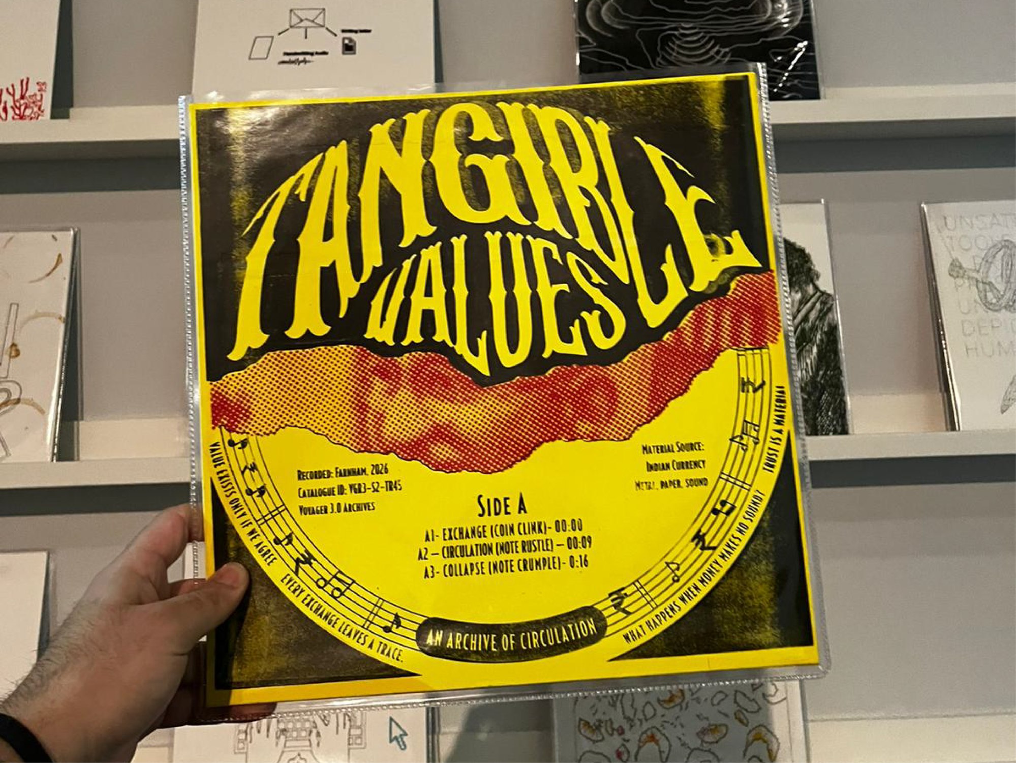 Physical screen-printed LP cover, front, photographed in a record shop